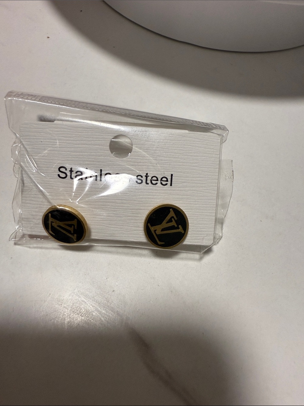 Black and Gold Round Logo Stud Earrings